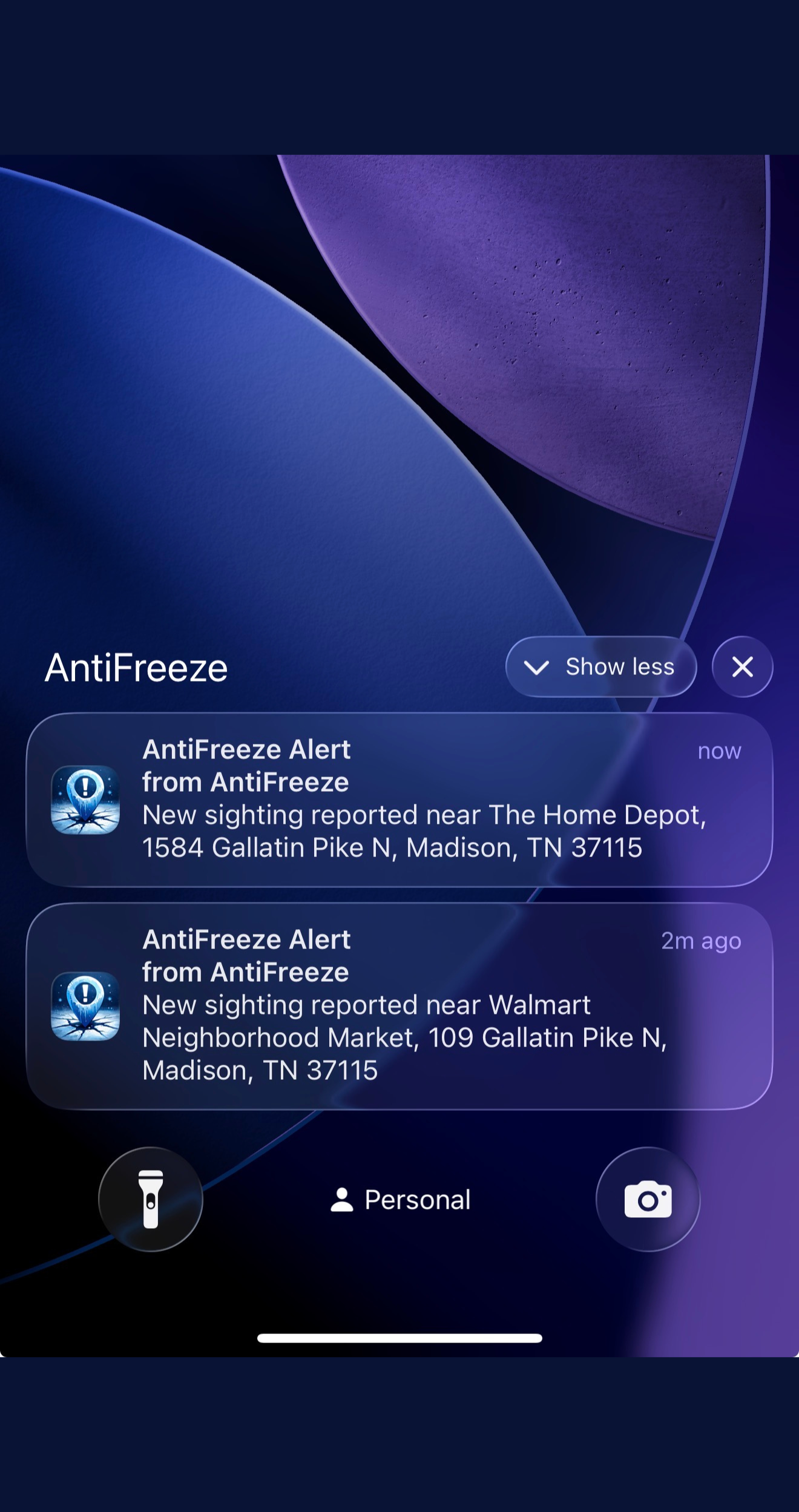 An iPhone lock screen showing a push notification of a new nearby ICE sighting.